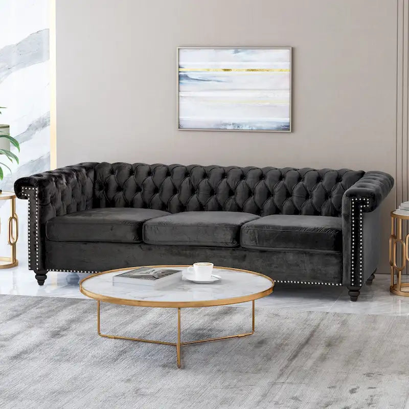 Canapé en velours capitonné avec clous décoratifs