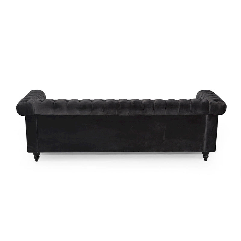 Canapé en velours capitonné avec clous décoratifs