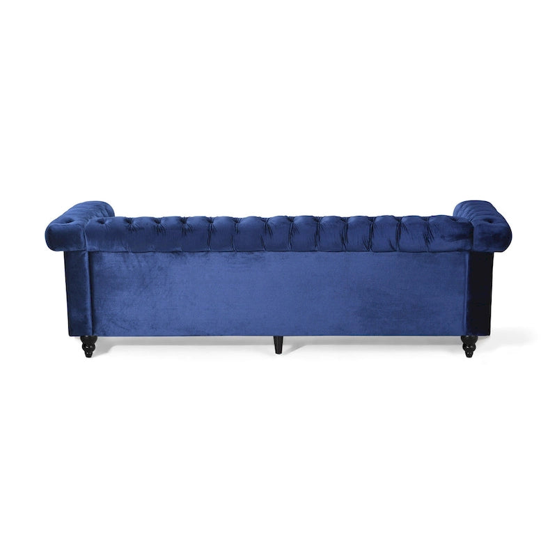 Canapé en velours capitonné avec clous décoratifs
