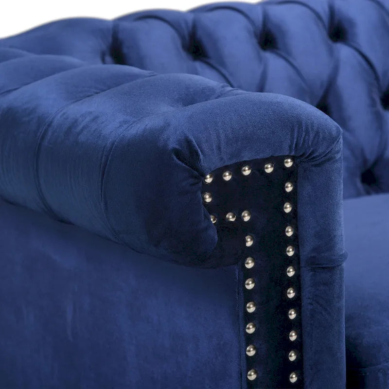 Canapé en velours capitonné avec clous décoratifs