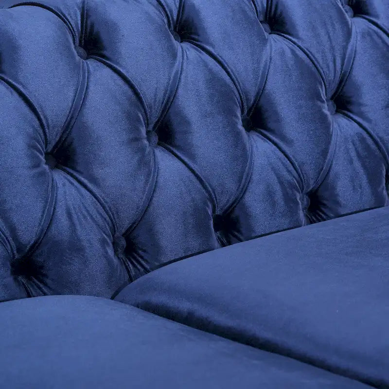 Canapé en velours capitonné avec clous décoratifs
