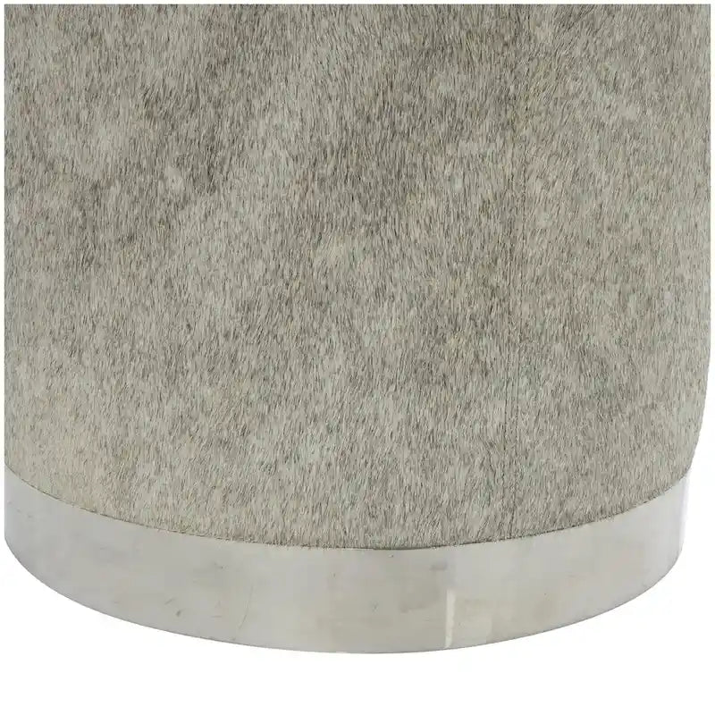 Tabouret patchwork en cuir poil gris avec piètement en métal argenté